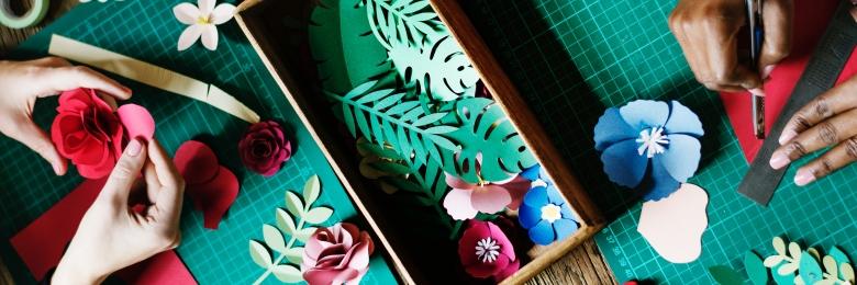 People making paper flowers