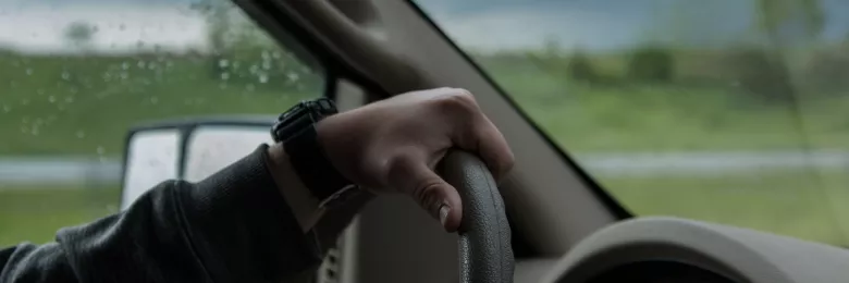 Person driving a car