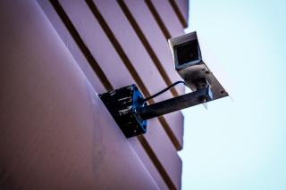 Security camera mounted on a wall